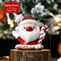 Cute Santa Claus resin figurine holding a candy cane, 5.7x4x5.3cm Christmas decor - Santa Claus SD01