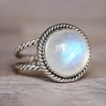 Double-layered vintage silver ring featuring a round moonstone with blue sheen effect - US 5 / White Gold