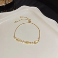 Elegant gold fish charm bracelet with yellow opal stones and adjustable slider clasp - S129 Gold