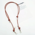 Detail of adjustable brown leather bag strap with gold metal buckles and knotted design - Gold Plate Hook / Tan