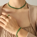 Vintage gold jewelry set featuring emerald green zircon stones with necklace and bracelet - Green Zirconia Necklace
