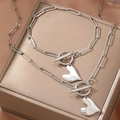 Parure collier et bracelet avec chaîne trombone, pendentif cœur et fermoir à bascule argenté - Argenté