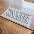 Bohemian cream woven cotton placemat with navy blue diamond pattern and white tassels - Black Grid Hemp