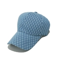 Detail of blue denim baseball cap featuring distressed diamond-shaped patterns and texture - Sky Blue