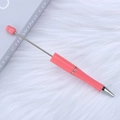 Extendable pink pointer pen with retractable silver metal rod and sleek plastic handle - Barbie Pink