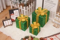 Three-piece set of sparkling green Christmas gift boxes with golden ribbons and bows - Green Bottom Colorful Star Christmas Gift Box