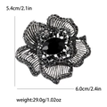 Vintage silver flower brooch with striped petals and large black faceted center stone - Black