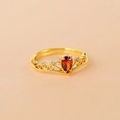 Gold plated ring featuring a pear-shaped red gemstone and crown hollow design - Gold Red Pear Gemstone Crown Ring
