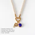 Elegant pearl necklace with letter P charm and blue gemstone pendant in 14K gold finish - Letter P
