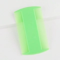 Macro detail of a light green double-sided flea comb for pets with fine plastic teeth - M / Green