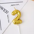 Golden number 2 birthday candle with metallic finish and plastic stick for cake toppers - Golden Number 2