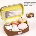 Deep brown travel cosmetic bag with yellow lining and mesh pocket for brushes, 23.5x14x9cm - Brown