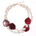 Double-layered necklace with white pearls and a striking red geometric pendant detail - Red