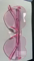 Pink heart-shaped rimless sunglasses with transparent jelly frame and candy color finish - Pink