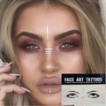 Detailed view of metallic freckles and star face tattoos on model for festivals - Style 8