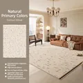 Minimalist beige rectangular carpet with dark dot pattern and non-slip backing - Natural Color