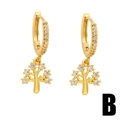 Elegant gold tree of life hoop earrings with white zircon accents on white background - Style B - White Zirconia Tree of Life