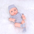 Realistic 20cm reborn baby doll wearing a grey striped outfit on a soft white blanket - Stripe Grey