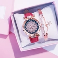 Close-up of rose gold watch with floral relief dial and matching star bracelet in a gift box - Floral Watch + Bracelet Set / Pink
