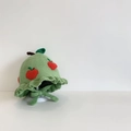 Detailed knit texture of a green baby apple hat with leaf accent and windproof straps - 48cm (6M-2Y) / Green