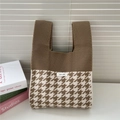 Close-up of houndstooth knit tote bag with brand label and textured fabric detail - 21*34cm / Camel