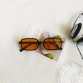 Retro rectangle sunglasses with black frames and vibrant orange lenses for street style - Black Frame Orange Lens