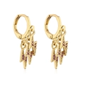 Close-up of gold lightning bolt earrings with three red zircon stone pendants - Gold with Red Zirconia