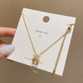 Elegante vergoldete Kronenhalskette mit beweglichem Zirkonia Anhänger und Edelstahlkette - Gold
