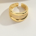 Detail of wide gold open ring featuring multi-row pave-set cubic zirconia stones - Adjustable Open / Layered White Zircon Style