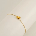 Adjustable 18K gold plated stainless steel bracelet with solid heart charm - Letter L