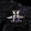 Detailed close-up of a silver hollow bear ring with a heart-shaped purple amethyst stone - Bear with Heart Gemstone (LR341)