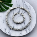 Silver Byzantine chain necklace and bracelet set on white marble plate with green leaf - 5mm / 55cm