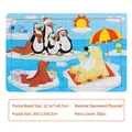 Wooden 30-piece arctic animal puzzle for kids featuring polar bears and penguins - Penguin