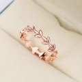 Roségouden ring met olijfblad-ontwerp en een gladde metalen afwerking voor dames - US 10 / Roségoud