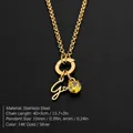 Roestvrijstalen ketting met letter G hanger en geel kristal in 14K gouden afwerking - Letter G
