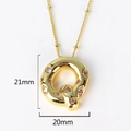 Macro detail of gold hip-hop letter Q pendant with crystals measuring 21mm by 20mm - Letter Q(XED218)