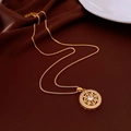 Detailed macro view of vintage gold pendant featuring floral openwork and white zircon - Gold Vintage Filigree Flower Disc (7#)