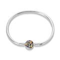 Detailed close-up of a silver snake chain bracelet with a carved sun and tree motif clasp - PAB015-Tree of Life