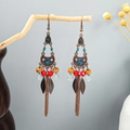 Bohemian bronze tassel earrings with colorful beads and metal leaf charms on wood - Multi-layer Tassel Bronze Alloy (E2843-2)