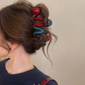 Pince à cheveux ondulée colorée rouge et bleu sarcelle sur cheveux bruns de mannequin - Pince à Cheveux Ondulée Color-Block (86#) / Noir/Rouge