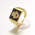 Macro shot of gold Hamsa hand ring with black enamel and clear sparkling rhinestones - Adjustable Open / Black