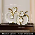 Nordic ceramic white and gold apple sculpture set with hollow heart and floral design - Set of 2 (Large + Small) / White Gold
