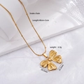 Golden snake chain necklace with large 3D bow pendant and fine pleated texture details - Pleated Bow 2510