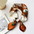 Floral silk square scarf with brown base and orange blooms tied in an elegant knot - Brown Border White Peony