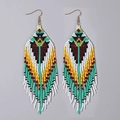 Handmade beaded tassel earrings with bohemian geometric patterns and golden hooks - Turquoise Red Yellow Orange