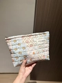 Quilted cotton cosmetic bag with floral patchwork pattern and zipper closure - Cosmetic Bag - Cotton Padded Blue Floral