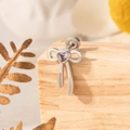 Silver bow knot stud earring with purple heart gemstone on a wooden display base - Single Piece / Blue-Purple (A324-3#)