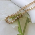 Macro shot of faceted champagne crystal glass beads for jewelry making and crafts - 4*6mm (Approx. 100pcs) / Amber Gold