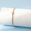 Bracelet en acier inoxydable plaqué or 18K avec zircon arc-en-ciel et gemme centrale - Avril/Zirconia Blanc