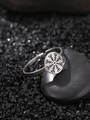Glow-in-the-dark stainless steel ring with Nordic symbol on professional stone display - Snowflake Style (NR308)